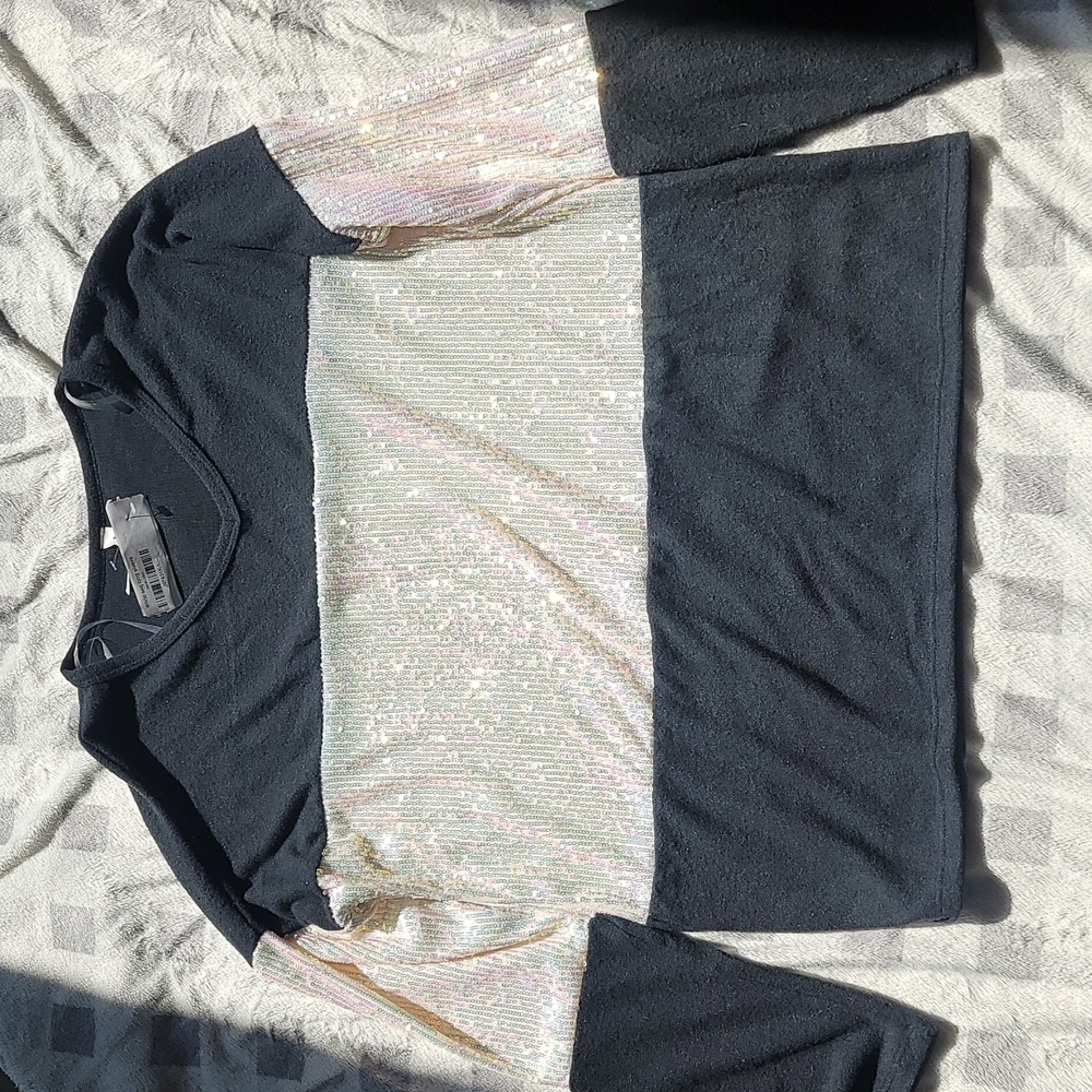 Black sweater with white sequin